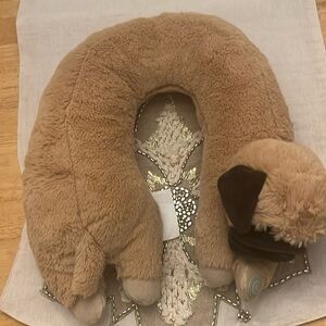 Pug Dog Neck Pillow Comfortable. Never used. It has a vibration mode as well.